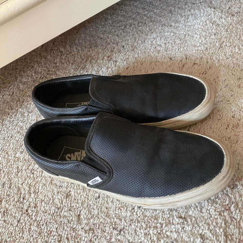 black leather slip on vans